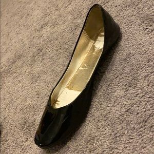 Gloss black flats